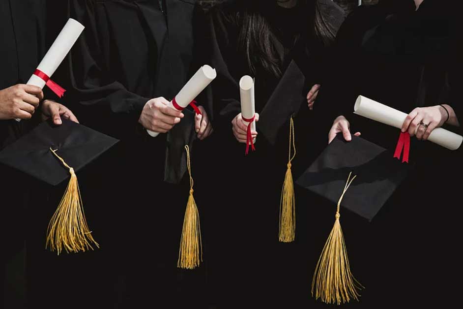 Blog 7 students with diplomas